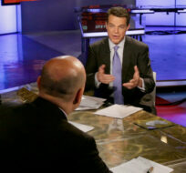 Fox News Channel anchor Shepard Smith, background right, conducts an interview during his "Studio B" program, in New York, Tuesday, May 24, 2011. Richard Drew/AP Photo. 