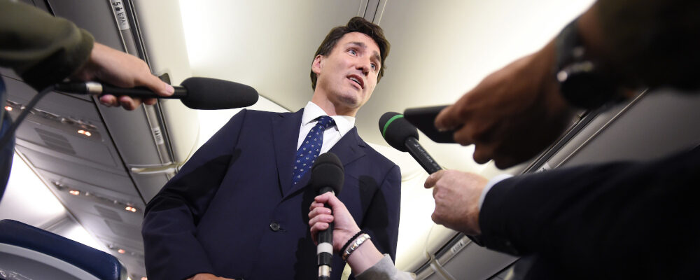 Liberal Leader Justin Trudeau responds to a question during a scrum on his campaign plane in Halifax, N.S., on Wednesday, September 18, 2019. Sean Kilpatrick/The Canadian Press. 