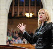 Minister of Labour Lisa Raitt responds to a question in the House of Commons on March 12, 2012. Sean Kilpatrick/The Canadian Press.