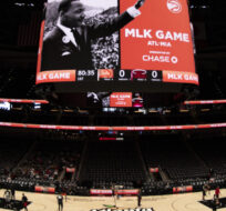 Martin Luther King Jr. is displayed on a screen before an NBA basketball game between the Atlanta Hawks and the Miami Heat on Jan. 16, 2023, in Atlanta. Hakim Wright Sr./AP Photo.
