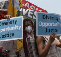 People protest outside of the Supreme Court in Washington on June 29, 2023. Jose Luis Magana/AP Photo.