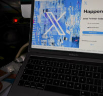 A view of a laptop showing the Twitter sign-in page on July 24, 2023. Darko Vojinovic/AP Photo.