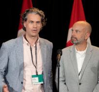 Dr. Mike Moffatt, left, Senior Director of Policy and Innovation at the Smart Prosperity Institute, University of Ottawa, and Tim Richter, President and CEO, Canadian Alliance to End Homelessness, speak to reporters after presenting their report on options to solve the national housing crisis at the Liberal Cabinet retreat in Charlottetown, Tuesday, Aug. 22, 2023. Darren Calabrese/The Canadian Press. 
