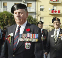 Canadian veterans march into Ortona, Italy on Wednesday Oct. 27, 2004 for a memorial service. Ryan Remiorz/The Canadian Press.