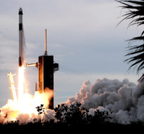 A SpaceX Falcon 9 rocket, with the Dragon capsule and a crew of four private astronauts, lifts off from Pad 39A at the Kennedy Space Center in Cape Canaveral, Fla., Sunday, May 21, 2023. John Raoux/AP Photo. 
