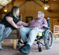 Sheri Levergood spends time with her mother, Janet Levergood at a long-term care residence where Janet now lives in Waterloo, Ont. on Tuesday, April 4, 2023. Peter Power/The Canadian Press. 