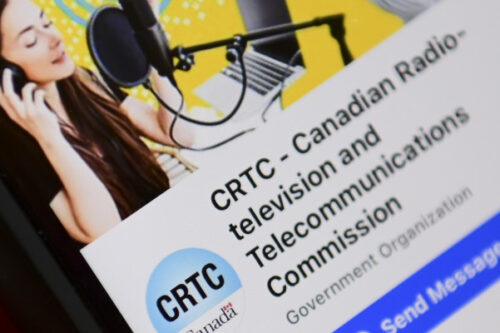 A person navigates to the online social-media pages of the Canadian Radio-television and Telecommunications Commission. Sean Kilpatrick/The Canadian Press.
