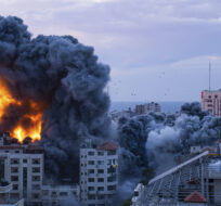 Fire and smoke rise following an Israeli airstrike in Gaza City on Oct. 7, 2023. Fatima Shbair/AP Photo.