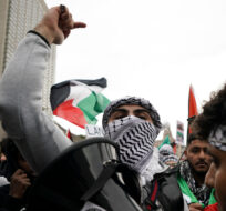 Protestors attend a march in support of Palestine in Toronto, Monday, Oct. 9, 2023. Arlyn McAdorey/The Canadian Press. 
