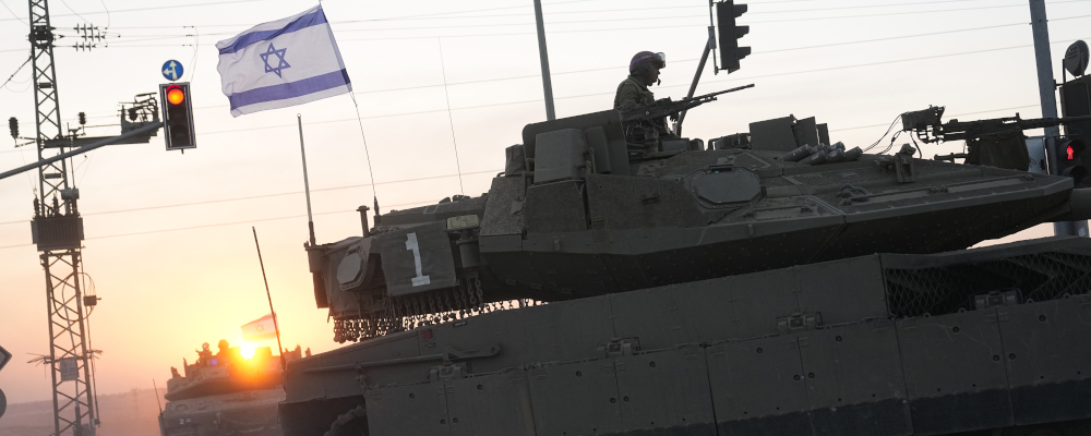 Israeli tanks head towards the Gaza Strip border in southern Israel on Oct. 12, 2023. Ohad Zwigenberg/AP Photo.
