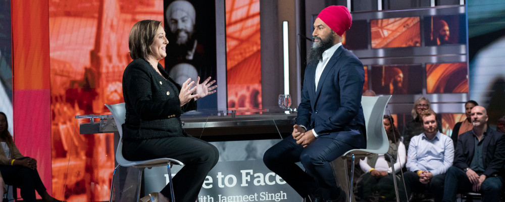 NDP Leader Jagmeet Singh is introduced by host Rosemary Barton during a townhall event in Toronto on Thursday, October 3, 2019. Paul Chiasson/The Canadian Press. 