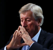 Mike Harris joins Preston Manning to take part in a panel discussion during the Canada Strong and Free conference in Ottawa on Friday, May 6, 2022. Sean Kilpatrick/The Canadian Press.