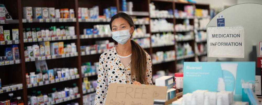Pharmacist Cathy Wang poses for a photograph at the 360Care Denman Pharmacy in Vancouver, B.C., on Oct. 3, 2022. Darryl Dyck/The Canadian Press.