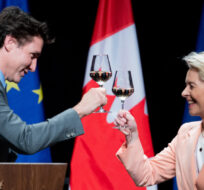 President of the European Commission, Ursula von der Leyen, and Prime Minister Justin Trudeau cheers as they take part in a reception at the Canadian War Museum in Ottawa, on Tuesday, March 7, 2023. Spencer Colby/The Canadian Press. 