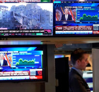 Federal Reserve Chairman Jerome Powell appears on several television screens on the floor of the New York Stock Exchange, Wednesday, Nov. 1, 2023. Richard Drew/AP Photo. 