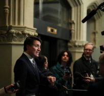 Prime Minister Justin Trudeau speaks to reporters as he arrives to a caucus meeting in Ottawa on Wednesday, Nov. 8, 2023. Sean Kilpatrick/The Canadian Press.