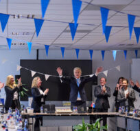 Far-right Party for Freedom leader Geert Wilders, center, celebrates with party members after winning the most votes in a general election, in The Hague, Netherlands, Thursday Nov. 23, 2023. Phil Nijhuis/AP Photo.