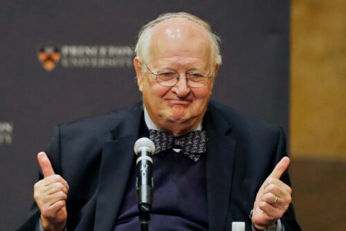 Angus Deaton gestures at a gathering at Princeton University after it was announced that he won the Nobel prize in economics for improving understanding of poverty and how people in poor countries respond to changes in economic policy Monday, Oct. 12, 2015. Mel Evans/AP Photo.