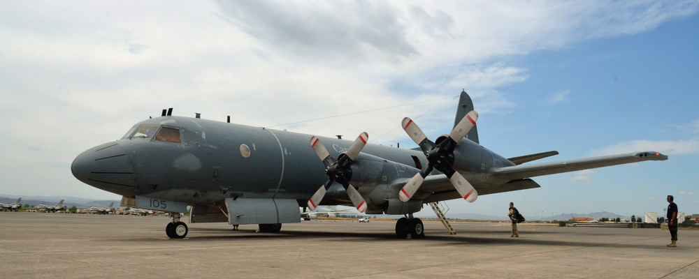A Canadian CP-140 Aurora on the tarmac at the Italian naval air station in Sigonella, Italy on July 25, 2011. Murray Brewster/The Canadian Press. 