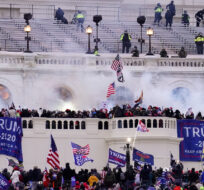 Violent protesters, loyal to President Donald Trump, storm the Capitol, Jan. 6, 2021, in Washington. John Minchillo/AP Photo.