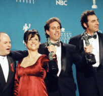In this Feb. 22, 1997 file photo, "Seinfeld" cast members, from left, Jason Alexander, Julia Louis-Dreyfus, Jerry Seinfeld and Michael Richards pose together backstage after they won Outstanding Performance by an Ensemble in a Comedy Series at the Screen Actors Guild Awards, in Los Angeles. Chris Pizzello/AP Photo.