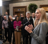 Members of Parliament and reporters listen as Canadian Heritage Minister Pascale St-Onge speaks about a deal with Google, Wednesday, November 29, 2023. Adrian Wyld/The Canadian Press.