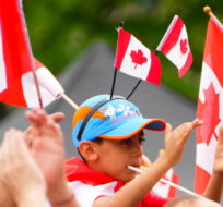 Canada Day celebrators enjoy Canada Day celebrations at LeBreton Flats in Ottawa on Friday July 1, 2022. Sean Kilpatrick/The Canadian Press. 