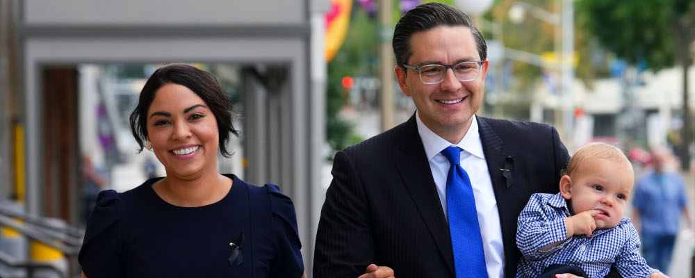 Conservative leader Pierre Poilievre and his wife Anaida and son Cruz arrive at the Conservative caucus meeting in Ottawa on Monday, Sept. 12, 2022. Sean Kilpatrick/The Canadian Press. 