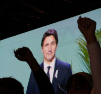 Protesters interrupt a speech by Prime Minister Justin Trudeau in Montreal, on Tuesday, December 6, 2022. Paul Chiasson/The Canadian Press