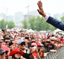 Prime Minister Justin Trudeau greets people attending Canada Day celebrations at LeBreton Flats, Ottawa on July 1, 2023. Justin Tang/The Canadian Press. 