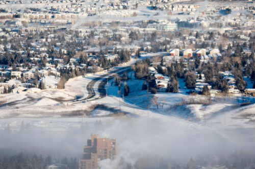 An ice fog hangs over steaming neighbourhoods in Calgary on Saturday, Jan. 13, 2024. Jeff McIntosh/The Canadian Press.