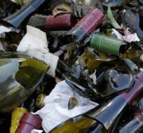 Broken bottles from the library wines of Saintsbury winery fill a grape bin following an earthquake Sunday, Aug. 24, 2014, in Napa, Calif. Eric Risberg/AP Photo. 