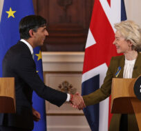 Britain's Prime Minister Rishi Sunak and EU Commission President Ursula von der Leyen, right, shake hands after a press conference at Windsor Guildhall, Windsor, England, Monday Feb. 27, 2023. The U.K. and the European Union ended years of wrangling and acrimony on Monday, sealing a deal to resolve their thorny post-Brexit trade dispute over Northern Ireland. Dan Kitwood/Pool via AP.