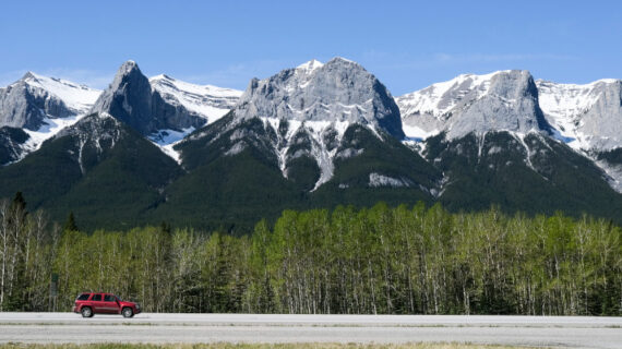 Traffic on the Trans Canada highway passing through Canmore, Alta., Sunday, May 30, 2021. Jeff McIntosh/The Canadian Press. 