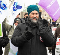NDP Leader Jagmeet Singh cheers during a rally to demand Canada's public health care system be protected and expanded, on Parliament Hill in Ottawa, Tuesday, Feb. 7, 2023. Spencer Colby/The Canadian Press.