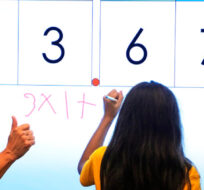 Elementary math teacher Margie Howells teaches a fifth grade class at Wheeling Country Day School in Wheeling, W.Va., on Tuesday, Sept. 5, 2023. Gene J. Puskar/AP Photo. 
