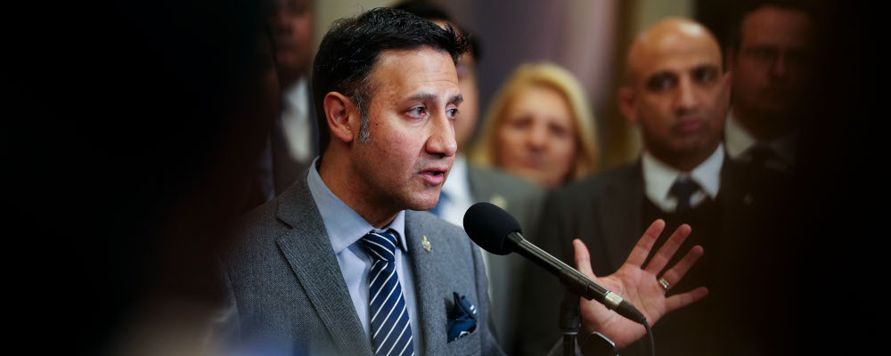 Justice Minister and Attorney General of Canada Arif Virani talks to media in the foyer of the House of Commons on Parliament Hill in Ottawa on Tuesday, Jan. 30, 2024. Sean Kilpatrick/The Canadian Press. 