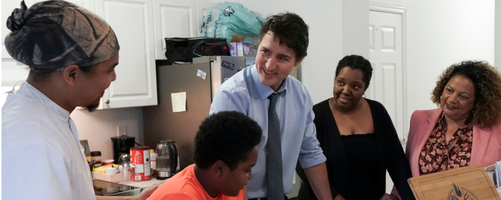 Prime Minister Justin Trudeau meets with the Thompson-Hitchins family to discuss affordable housing, in Caledon, Ont., on Thursday, Feb. 1, 2024. Arlyn McAdorey/The Canadian Press.