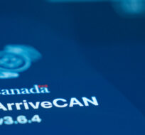 Canada's ArriveCAN app log in screen is seen on a mobile device, Monday, Feb. 12, 2024 in Ottawa. Adrian Wyld/The Canadian Press. 