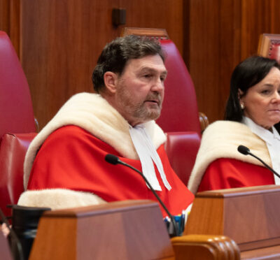 Supreme Court of Canada Justice Andromache Karakatsanis (left), Justice Suzanne Cote and Justice Sheilah Martin listen as Chief Justice Richard Wagner speaks during a welcome ceremony at the Supreme Court, in Ottawa, Monday, Feb. 19, 2024. Adrian Wyld/The Canadian Press. 