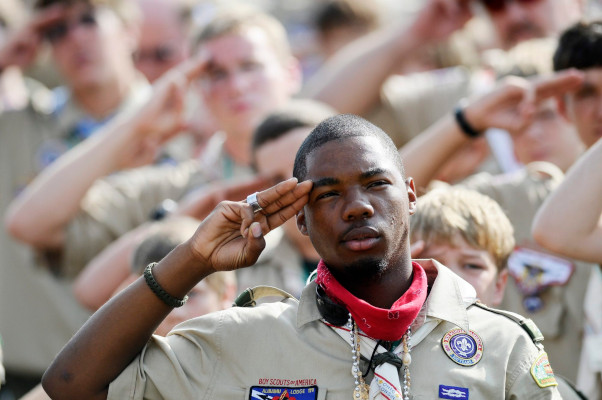 Scouts salute during the National Anthem at Wednesday's arena show at the 2010 National Boy Scout Jamboree at Fort AP Hill in Bowling Green, Va., Wednesday, July 28, 2010. (Robert A. Martin/AP Photo/The Free Lance-Star)