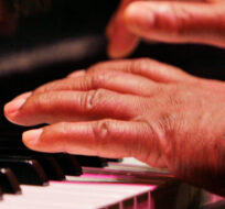 Herbie Hancock plays the piano in New Orleans Monday, April 2, 2007. Alex Brandon/AP Photo.