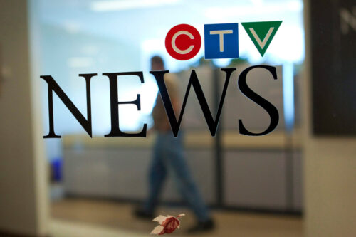 Staff work at the offices of CTVglobemedia in Ottawa on Sept. 10, 2010. Sean Kilpatrick/The Canadian Press.