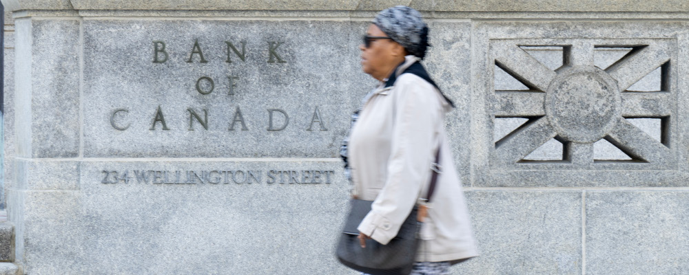 A woman walks past the Bank of Canada building, Wednesday, September 6, 2023 in Ottawa. Adrian Wyld/The Canadian Press. 