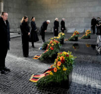 A wreath laying ceremony at the central German memorial for the victims of war and tyranny 'Neue Wache' on the occasion of the 'Volkstrauertag', Germany's national day of mourning, in Berlin, Germany, Sunday, Nov. 19, 2023. (AP Photo/Markus Schreiber)