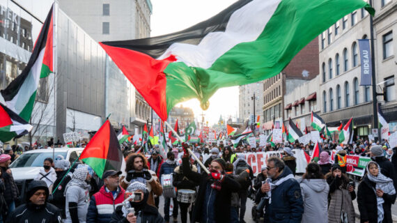 Pro-Palestinian protesters are seen during a protest in downtown Ottawa, on Saturday, Nov. 25, 2023. Spencer Colby/The Canadian Press. 
