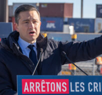 Federal Conservative Party leader Pierre Poilievre speaks about his car theft policy during a news conference at the Port of Montreal on Tuesday, February 6, 2024. Ryan Remiorz/The Canadian Press.