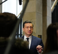 Conservative Leader Pierre Poilievre talks to media at a party caucus meeting on Parliament Hill in Ottawa on Wednesday, Feb.7, 2024. Sean Kilpatrick/The Canadian Press. 