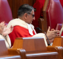 Justice Sheilah Martin and Justice Mahmud Jamal applaud Justice Mary Moreau during a welcome ceremony at the Supreme Court, in Ottawa, Monday, Feb. 19, 2024. Adrian Wyld/The Canadian Press. 