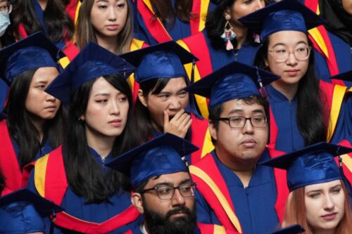Spring 2020 graduates listen during a convocation ceremony at Simon Fraser University, in Burnaby, B.C., on Friday, May 6, 2022. Darryl Dyck/The Canadian Press. 